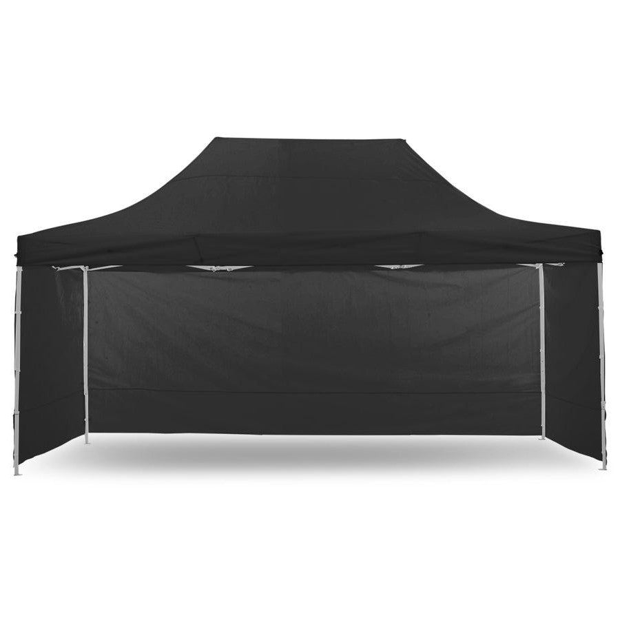 Black 3 x 6 m portable gazebo with sidewalls fitted, set up on grass