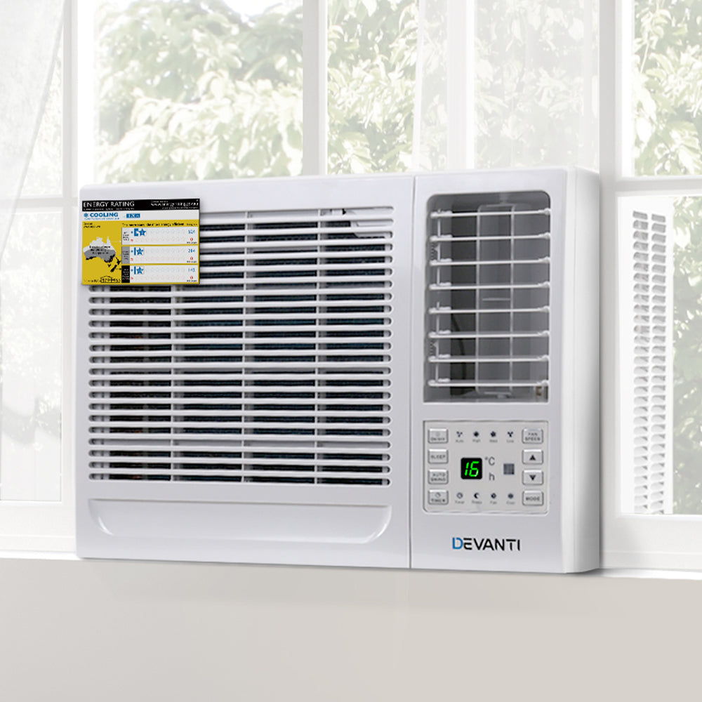 Side view of window air conditioner measuring 47 x 52 x 36 cm