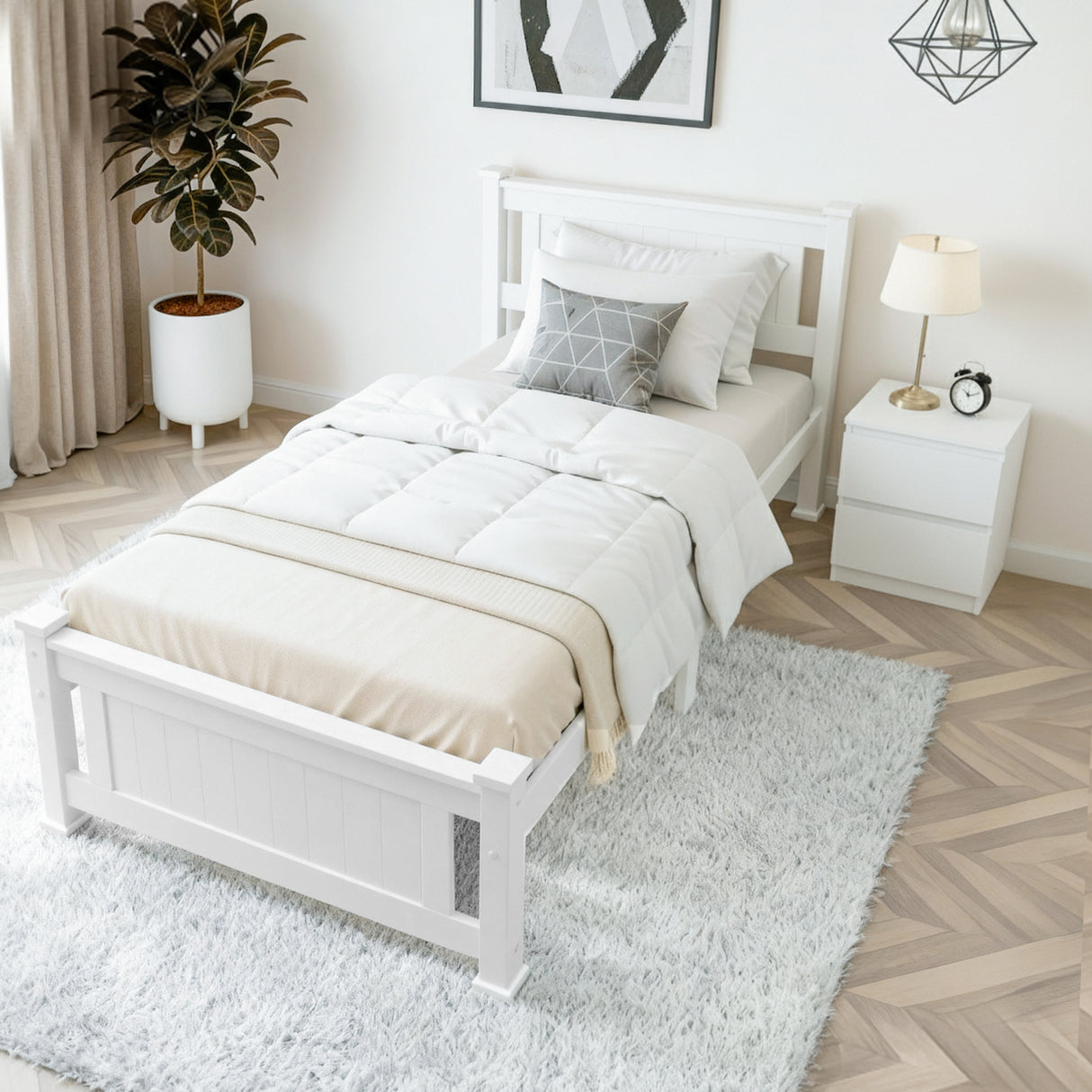 Tomaree king single pine bed with a matching timber bedside table in a warm bedroom