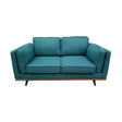 Marbella teal fabric sofa in a modern living room