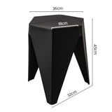 Leongatha puzzle stool black beside a kitchen island
