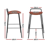 Corinella brown padded bar stool with black metal frame in a modern kitchen