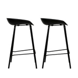 Carrum black metal bar stool with moulded seat in a minimalist kitchen