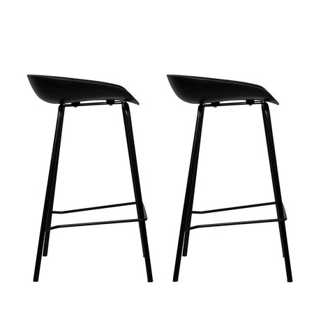 Carrum black metal bar stool with moulded seat in a minimalist kitchen