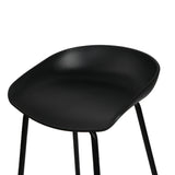 Carrum black metal bar stool with moulded seat in a minimalist kitchen