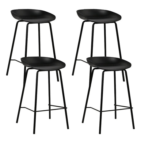 Carrum black metal bar stool with moulded seat in a minimalist kitchen