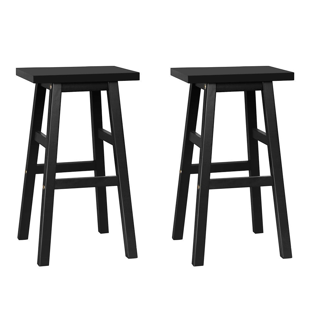 McCrae black solid beech wood bar stool with saddle seat in a kitchen