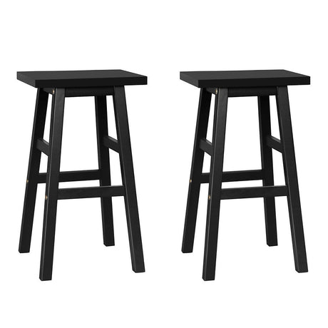 McCrae black solid beech wood bar stool with saddle seat in a kitchen