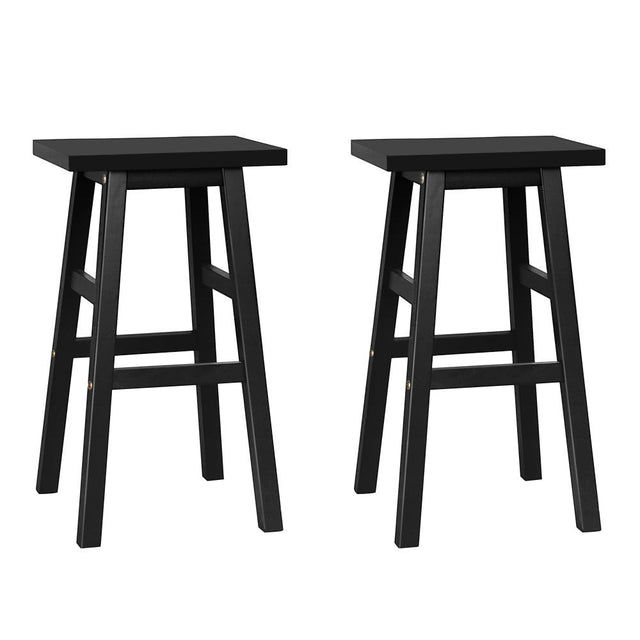 McCrae black solid beech wood bar stool with saddle seat in a kitchen