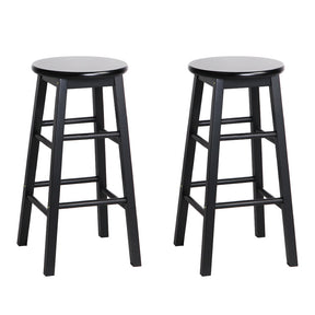 Beaumaris black beech wood round bar stools pair at a kitchen counter