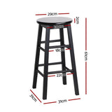 Shelly Beach black beech wood bar stool with round seat in a kitchen