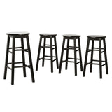 Shelly Beach black beech wood bar stool with round seat in a kitchen