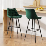 Bonbeach green velvet bar stool with tufted seat and black metal legs in a modern kitchen