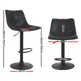 Korumburra vintage swivel bar stool black beside a kitchen island