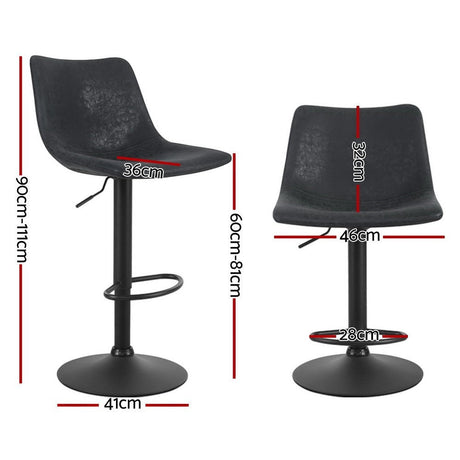 Korumburra vintage swivel bar stool black beside a kitchen island