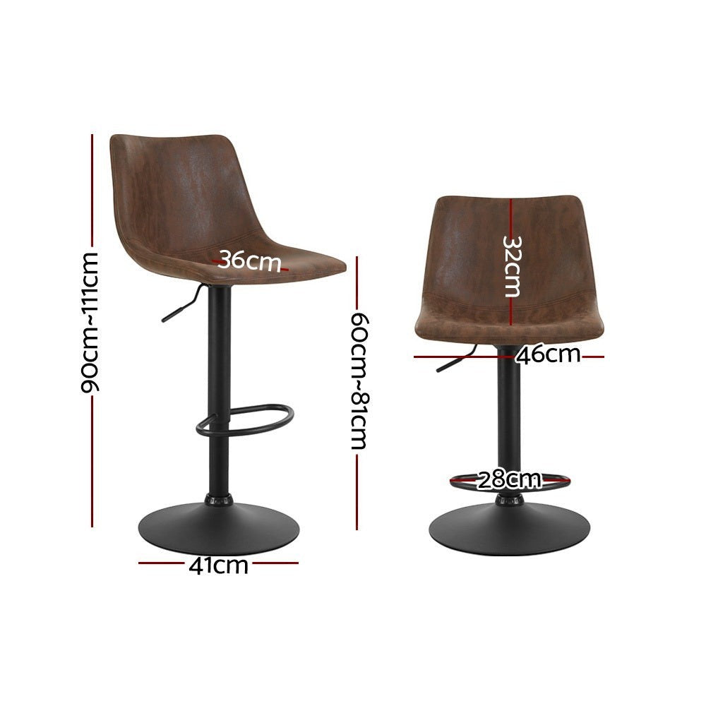 Korumburra vintage swivel bar stool brown beside a kitchen island