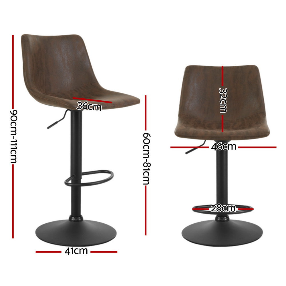 Korumburra vintage swivel bar stool brown beside a kitchen island