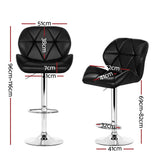 Four Artiss gas lift leather bar stools at kitchen island — Allure Home Collections