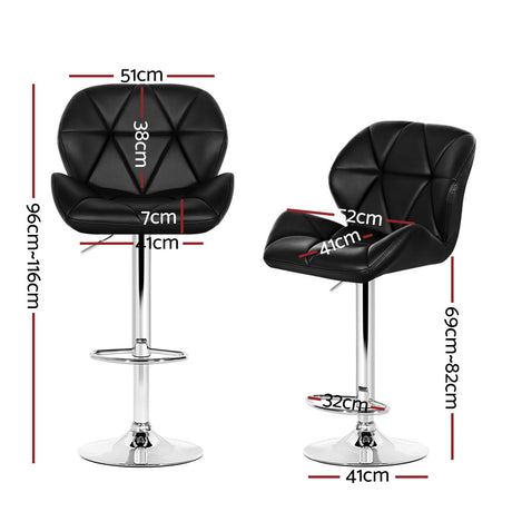 Four Artiss gas lift leather bar stools at kitchen island — Allure Home Collections