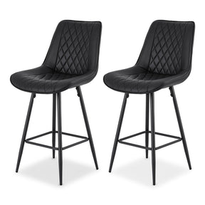 Chelsea black diamond stitched bar stool with metal frame at a kitchen counter