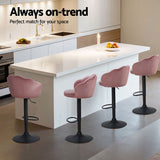 Two Artiss velvet bar stools styled at white kitchen island — Allure Home Collections