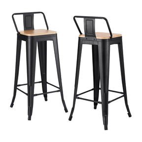 Cannons Creek black stackable industrial bar stool with pine seat in a kitchen
