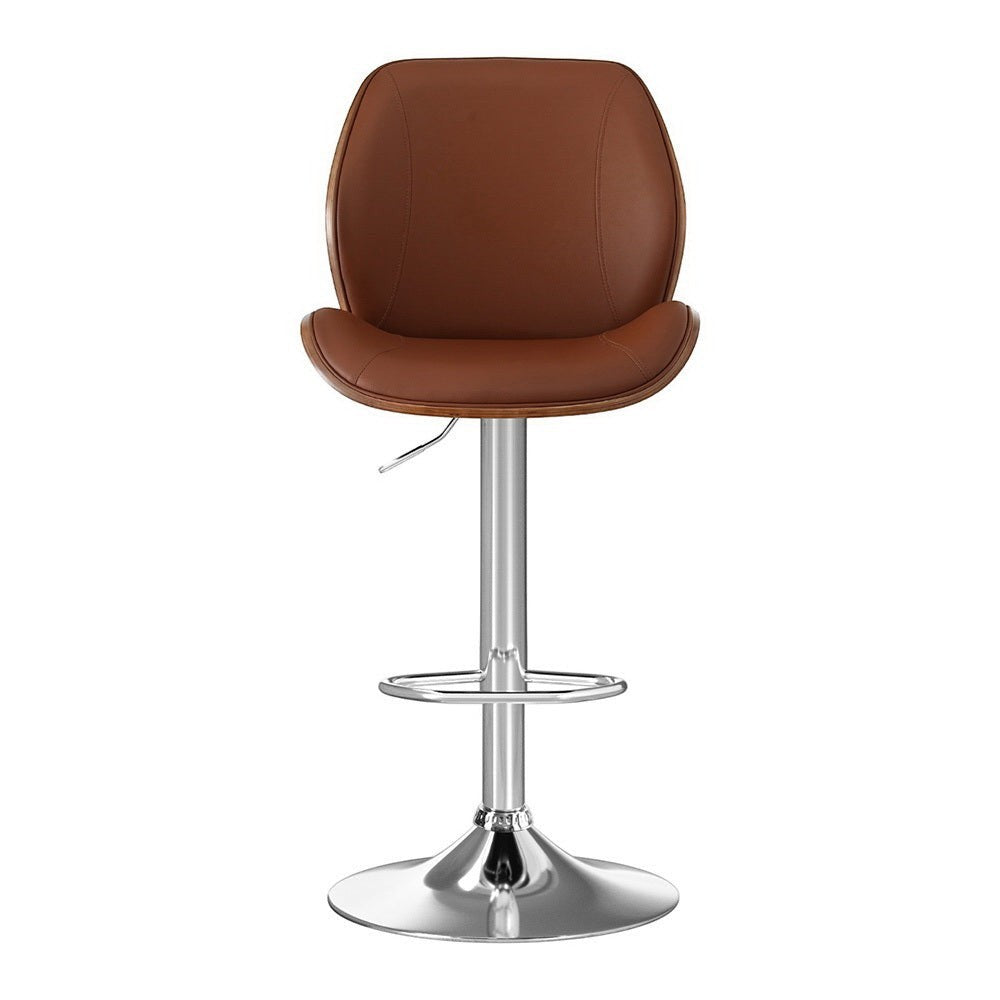 Karingal brown bentwood bar stool with adjustable leather seat at a kitchen counter