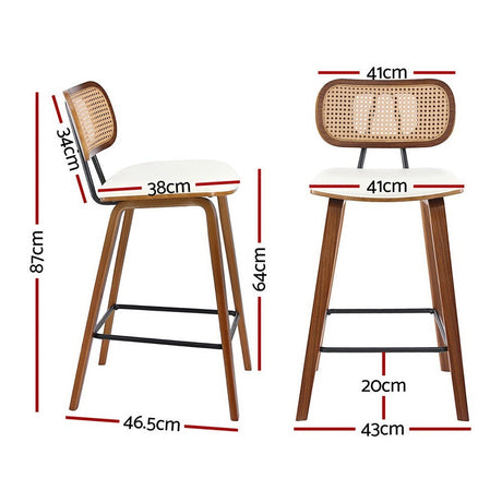 Warneet beige rattan bar stool with walnut frame at a kitchen counter
