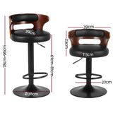 Seaford North black gas lift bar stool with padded mid back seat at a kitchen counter
