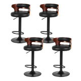 Seaford North black gas lift bar stool with padded mid back seat at a kitchen counter