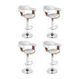 Sorrento white faux leather swivel bar stool with gas lift in a modern kitchen
