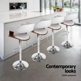 Four Artiss white gas lift armrest bar stools in contemporary kitchen — Allure Home Collections