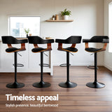 Four Artiss all black gas lift armrest bar stools in kitchen — Allure Home Collections