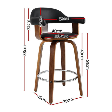 Glen forbes wooden leg bar stool black beside a kitchen island