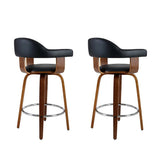 Close up of the glen forbes wooden leg bar stool black seat and frame