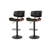 Blind Bight black gas lift swivel bar stool with chrome base in a modern kitchen