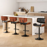 Blind Bight black gas lift swivel bar stool with chrome base in a modern kitchen