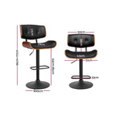 Blind Bight black gas lift swivel bar stool with chrome base in a modern kitchen