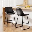 Camerons Bight black padded metal bar stool with stitched faux leather seat