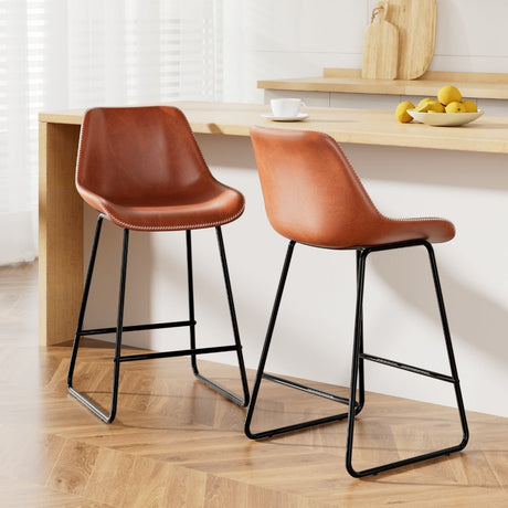 Camerons Bight brown padded metal bar stool with stitched faux leather seat
