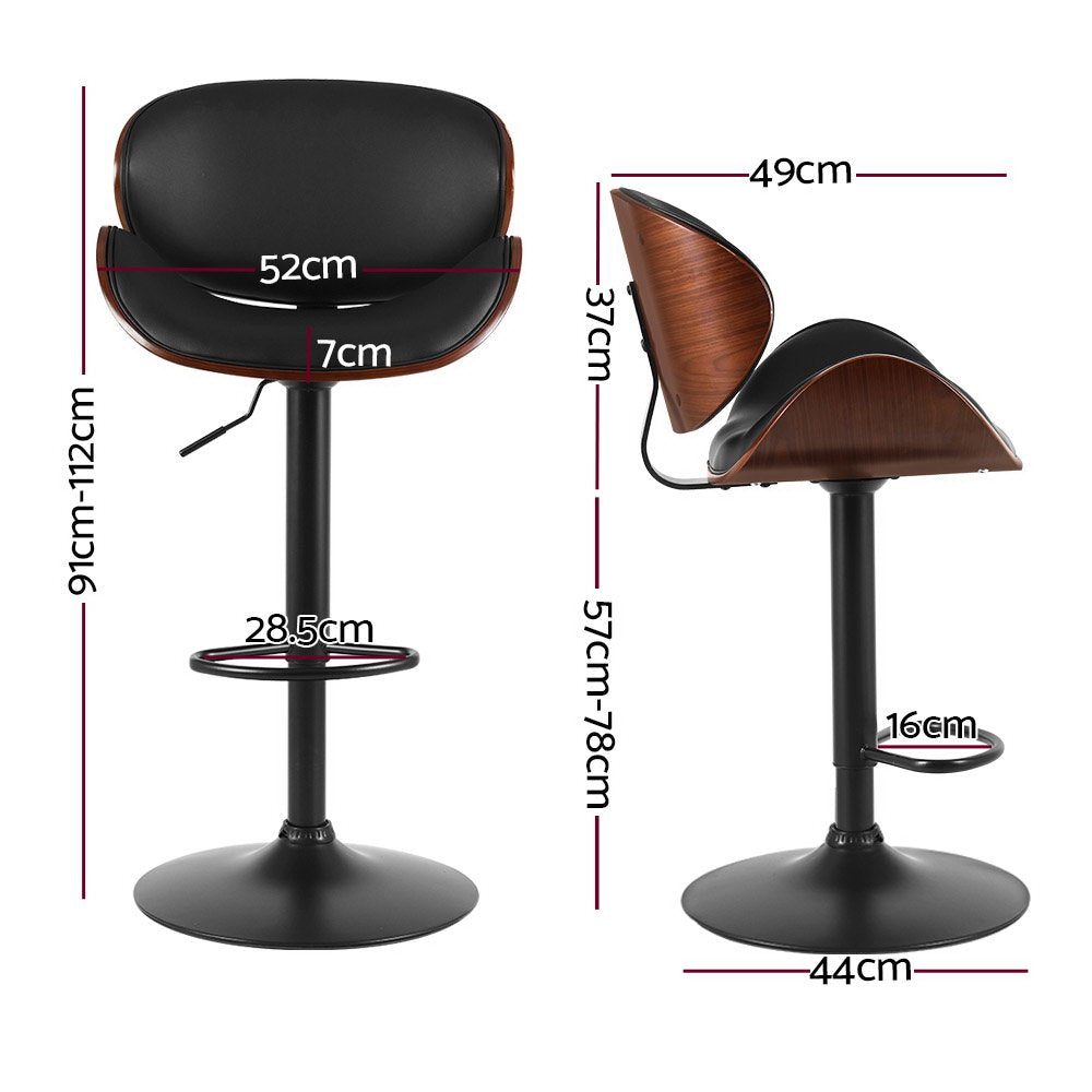 Carrum Downs black gas lift bar stool with padded leather seat at a kitchen counter
