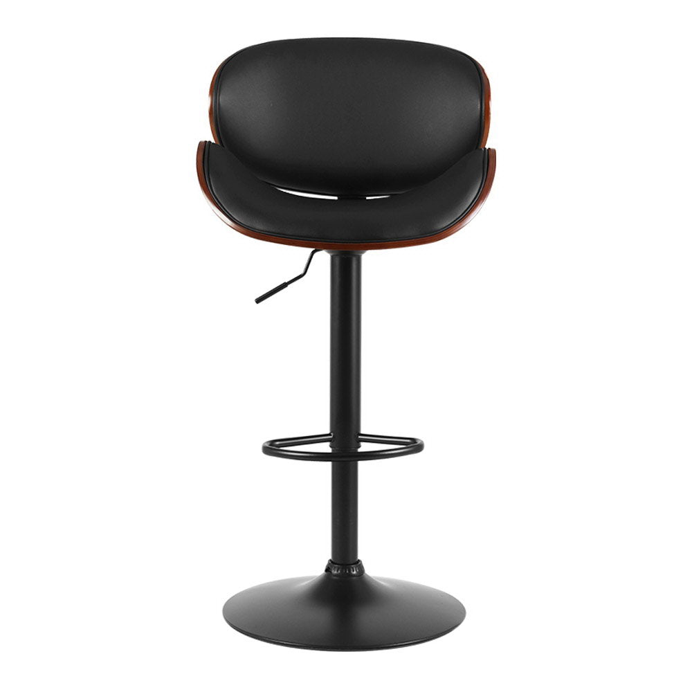 Carrum Downs black gas lift bar stool with padded leather seat at a kitchen counter