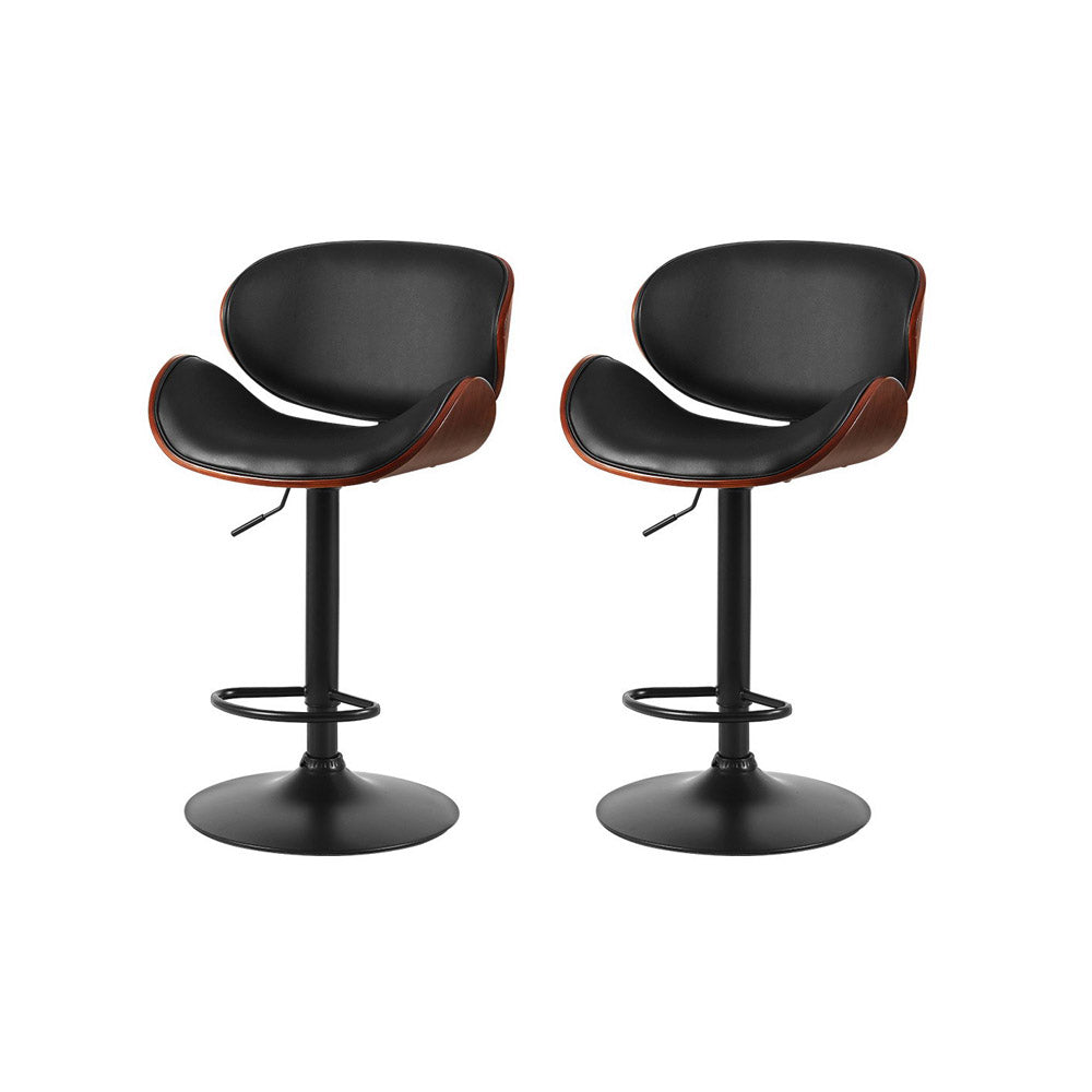 Carrum Downs black gas lift bar stool with padded leather seat at a kitchen counter