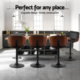 Four Artiss Joyce black bar stools in contemporary kitchen — Allure Home Collections