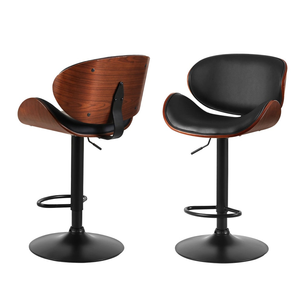 Carrum Downs black gas lift bar stool with padded leather seat at a kitchen counter