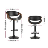 Tenby Point black gas lift swivel bar stool with curved backrest in a modern kitchen