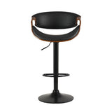 Tenby Point black gas lift swivel bar stool with curved backrest in a modern kitchen