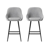 Beaumaris grey upholstered bar stool with winged backrest at a kitchen counter