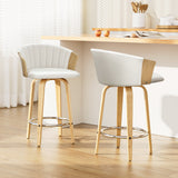 Mornington white faux leather bentwood swivel bar stool in a modern kitchen