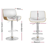 Mills Beach white gas lift bar stool with curved bentwood seat at a kitchen island